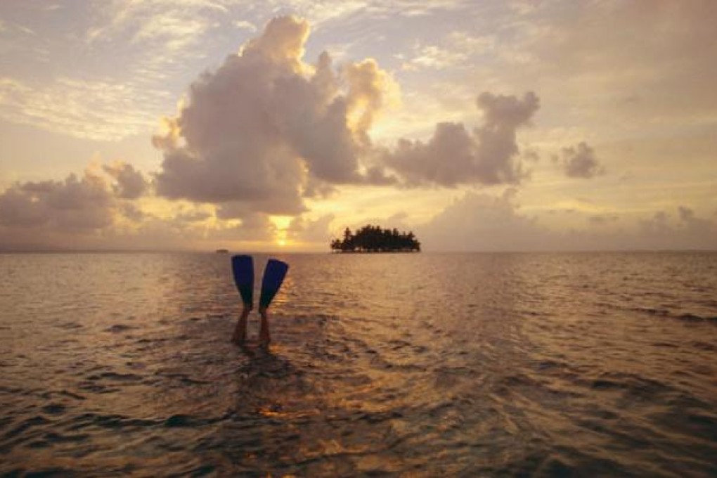 An evening dip in the San Blas archipelago. Photos: Corbis; Cameron Dueck