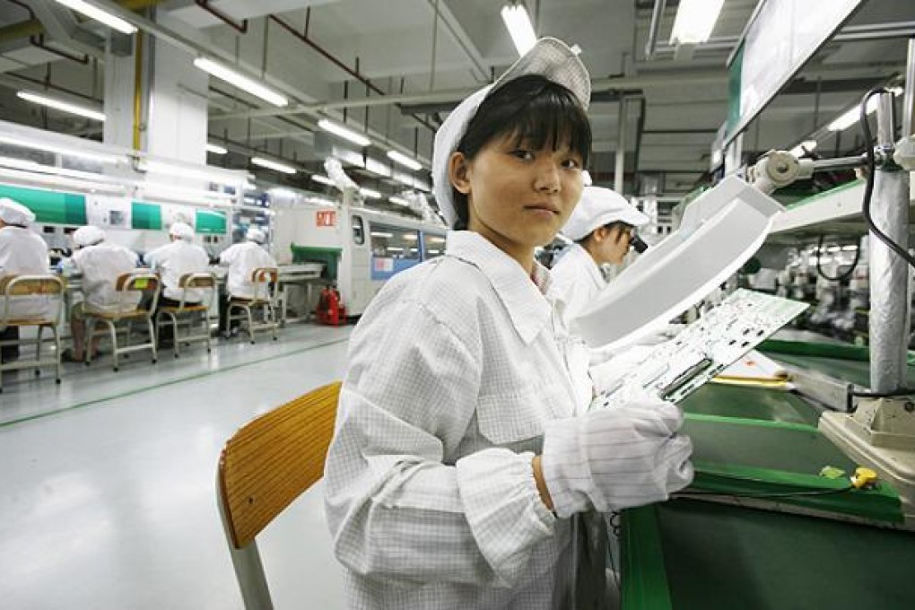A worker at Foxconn's Longhua factory in Shenzhen. Photo: Reuters