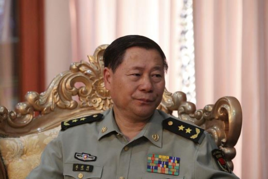 General Qi Jianguo, Deputy Chief of Staff of China's military, attends a meeting in Phnom Penh to close a deal involving 12 helicopters.