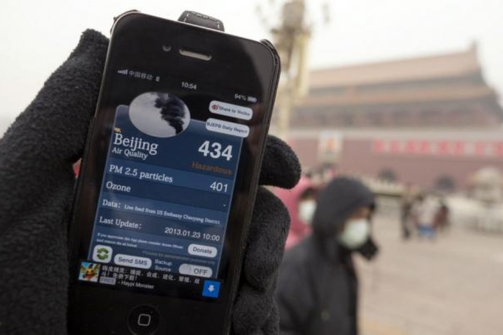 A smartphone app relaying data from the US embassy's air quality sensor shows hazardous levels of fine-particle pollution in Beijing yesterday. Meteorologists have blamed the quick melting of recent snowfalls for pollution bad enough to make healthy people sick. Traffic almost came to a standstill in some areas due to poor visibility. Photo: EPA