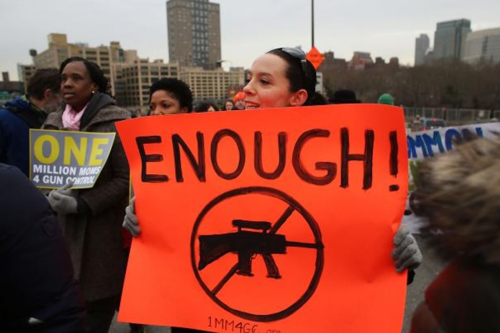 Gun control activists march across Brooklyn Bridge. Photo: AFP