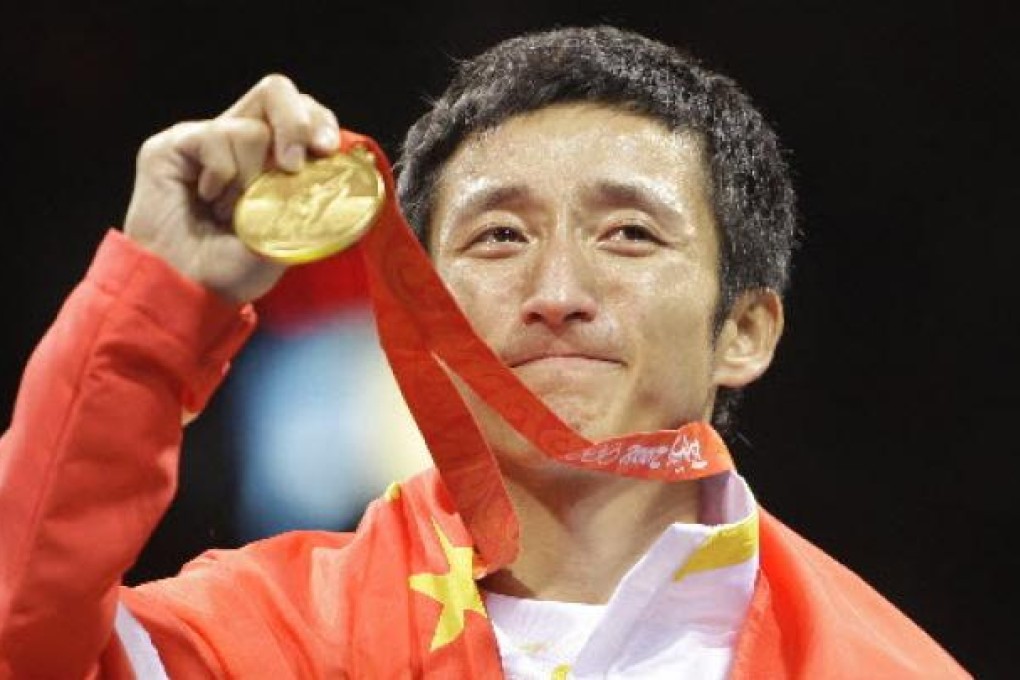 Zou Shiming of China. Photo: AP