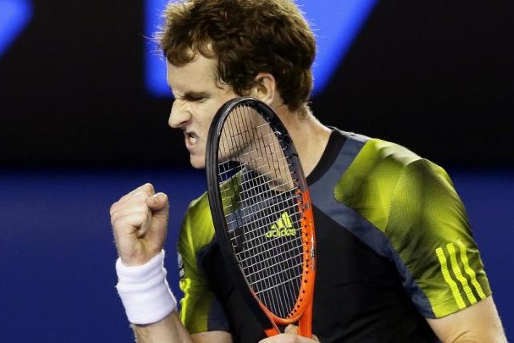 Andy Murray pumps himself up during an enthralling Australian Open semi-final against Roger Federer. Photo: EPA