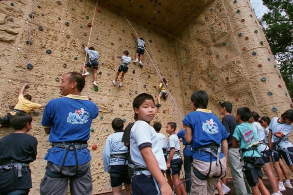 Climbing the wall at the YMCA King's Park Centenary Centre. Photo: May Tse