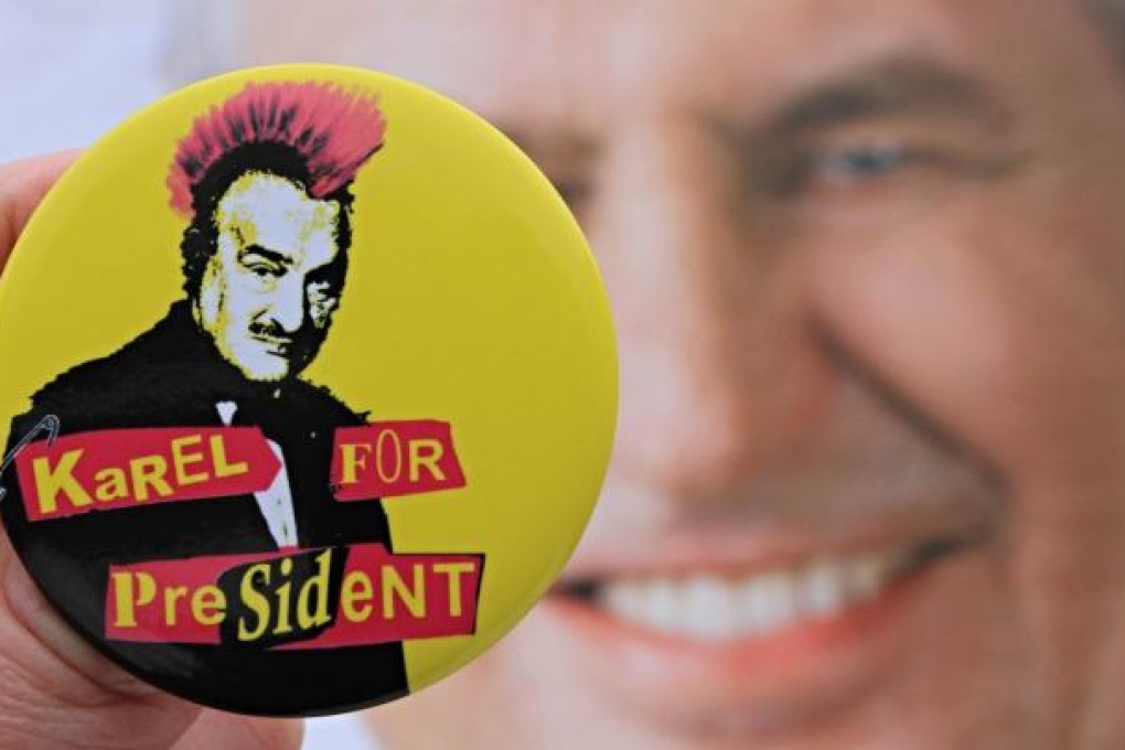 Badge depicting Schwarzenberg as a punk. Photo: AFP