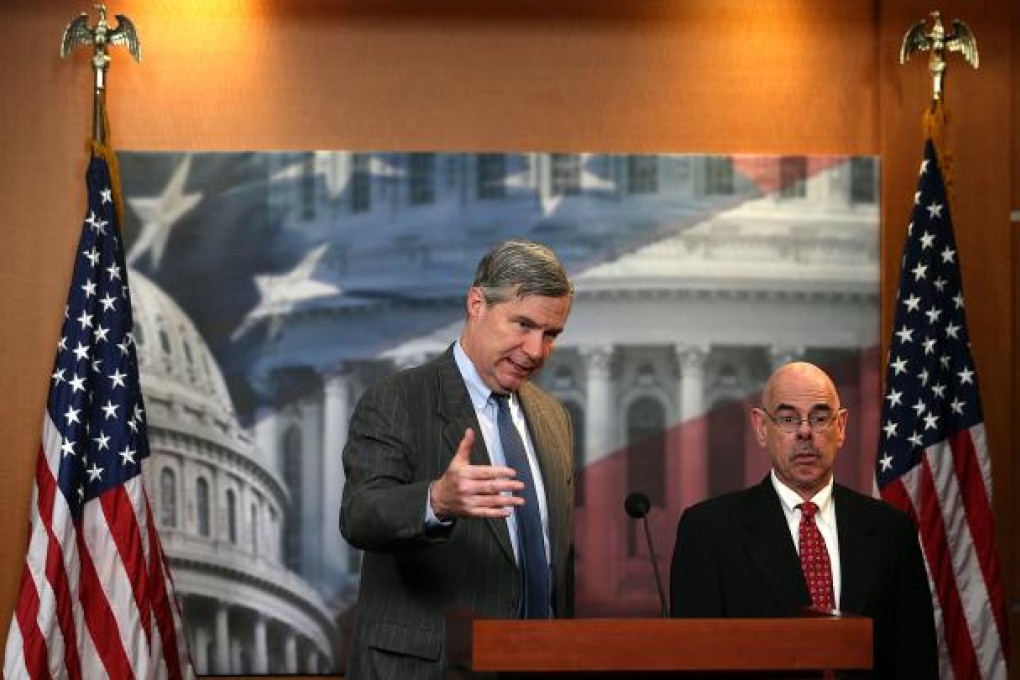 Senator Sheldon Whitehouse (left) and Henry Waxman speak to the media during a news conference. Photo: AFP