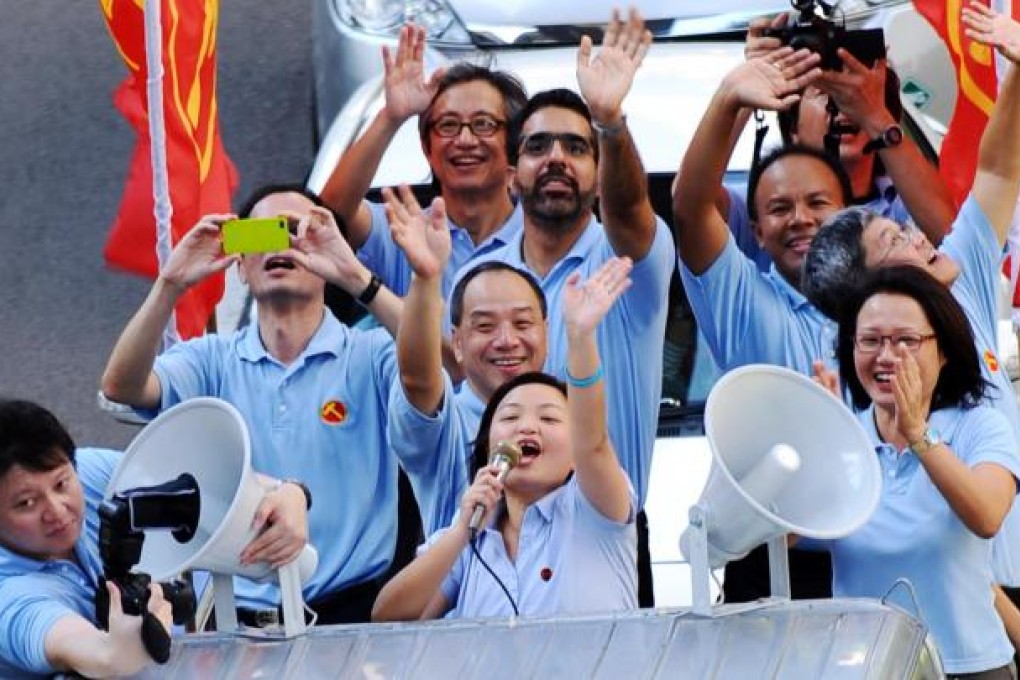 Workers' Party candidate Lee Li Lian (centre) shows her appreciation to the residents of Punggol East in Singapore. Photo: Xinhua