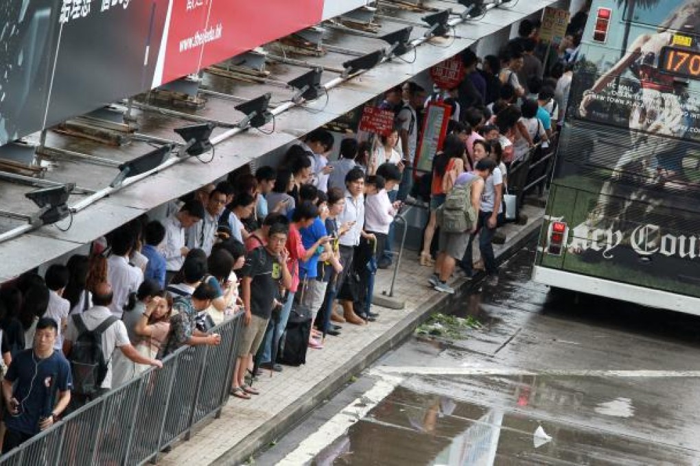 Long queues are seen in Cross Harbour Tunnel Toll Plaza Bus Stops in Hung Hom. Photo: May Tse