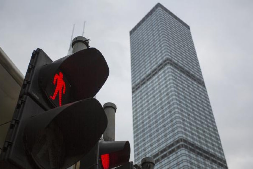 Property developers rushed to take advantage of record low fundraising costs. Cheung Kong also joined the fray, raising US$500 million. Photo: Bloomberg