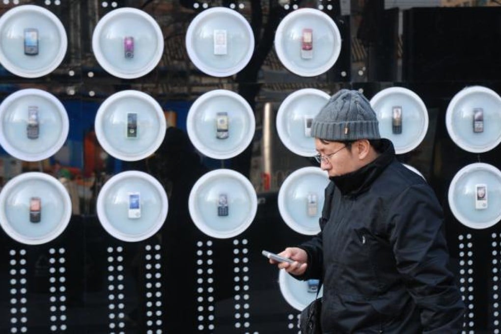 The number of SMS messages sent by Chinese mobile users rose a scant 2 per cent last year. Photo: AFP