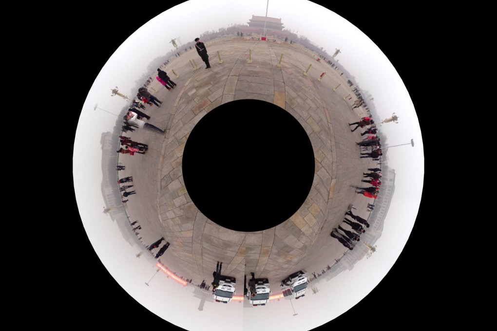 Smog clouds the horizon in a panorama view of Tiananmen Square in Beijing yesterday. Smog is still dense in the capital. Photo: Simon Song