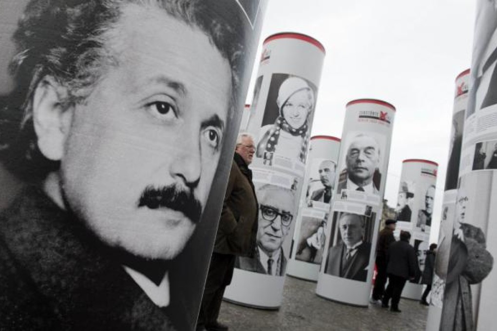 A portrait of Albert Einstein appears in an outdoor exhibition commemorating with the 80th anniversary of Adolf Hitler's rise to power, on January 30, 1933. Photo: AFP