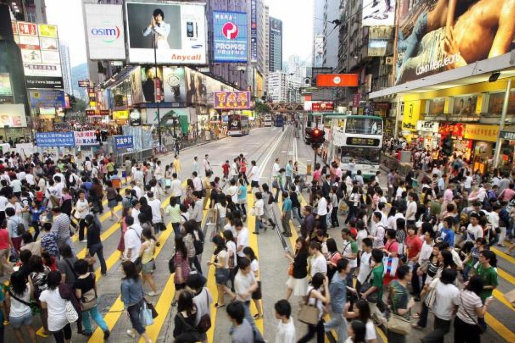Total advertising expenditure in Hong Kong rose 13 per cent last year from HK$36.03 billion in 2011, despite weak market sentiment caused by the sluggish economy. Photo: AFP