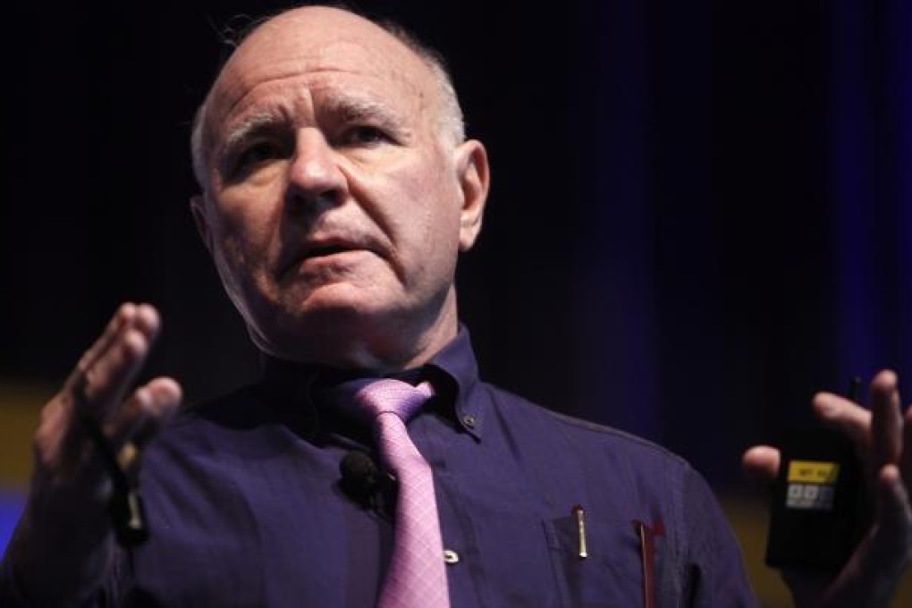 Swiss investment analyst and entrepreneur Marc Faber speaks in Hong Kong on September 23, 2011. Photo: EPA