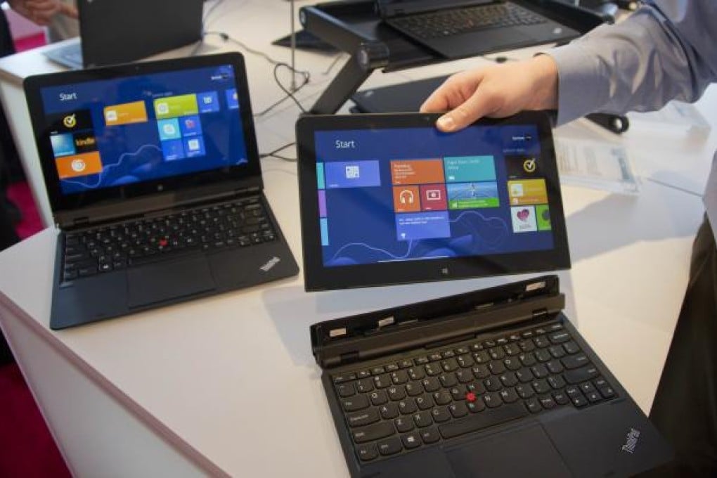 Lenovo will step up the international expansion of its smartphone business and sales of premium-priced laptop computers. Photo: AP