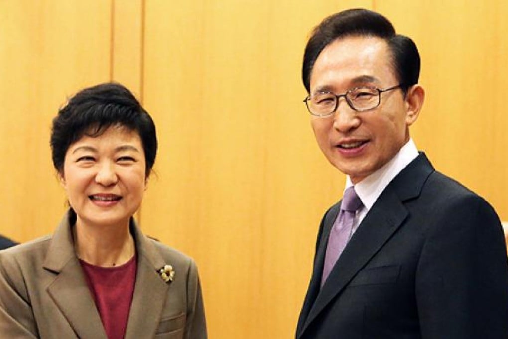 Incoming South Korea president Park Geun-hye and current President Lee Myung-bak. Photo: AP