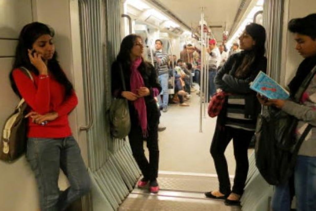 Indian women travel inside a Women Only metro train compartment in New Delhi. Five men pleaded not guilty on Saturday in a court on 13 charges, including rape and murder, in the fatal rape on a New Delhi bus. Photo: AP