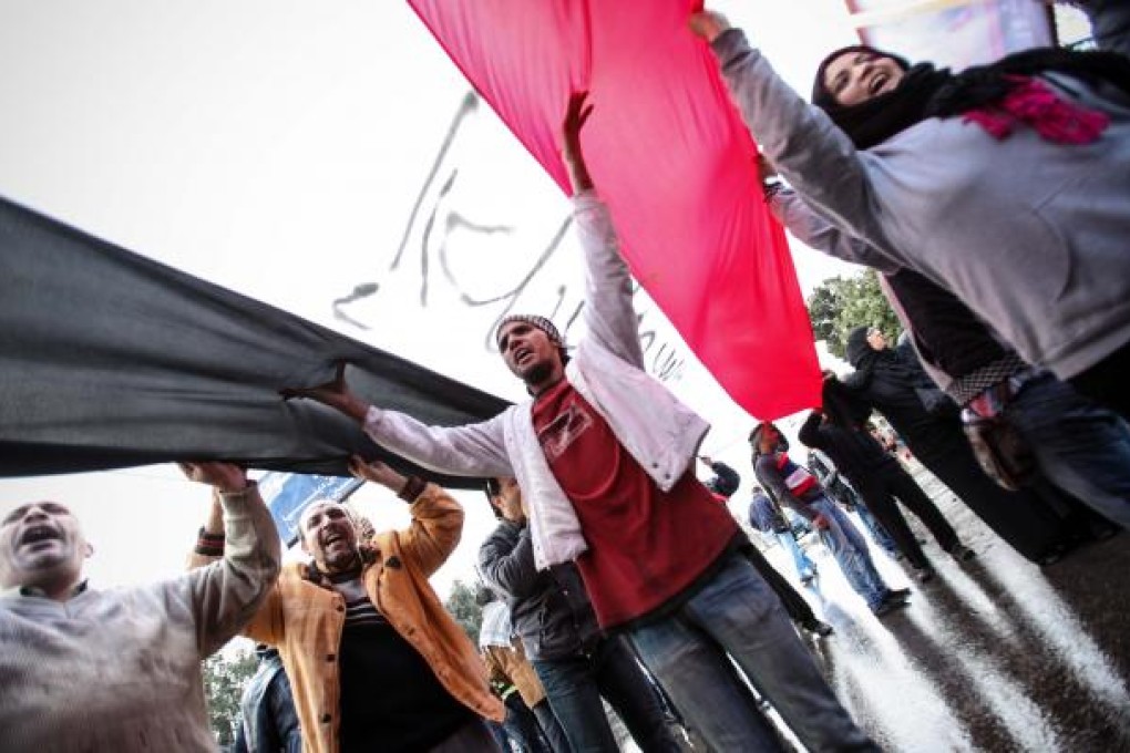 Anti-Mursi protesters rally in central Cairo. Photo: Xinhua