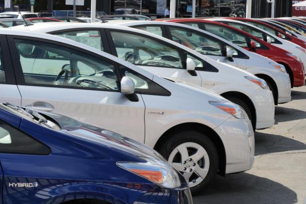 Toyota Prius hybrid taxis could help reduce smog. Photo: AFP