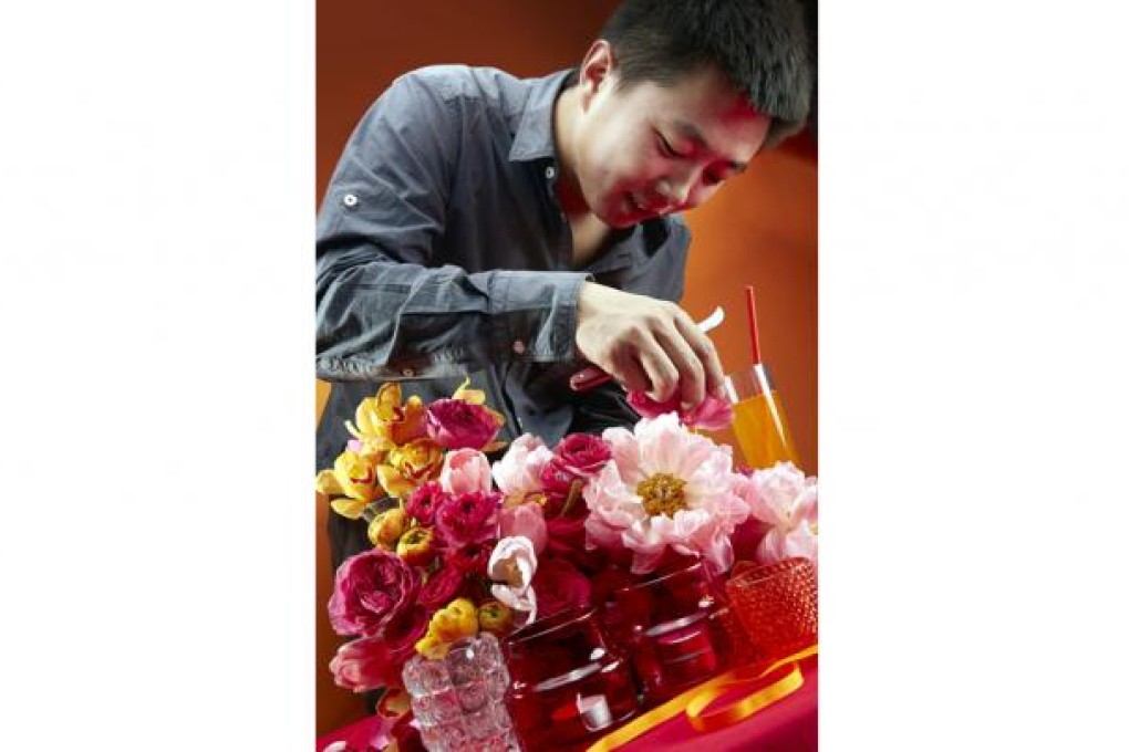 Cao Xue is always thinking of new ways to ensure his business in Beijing is coming up roses. Photo: SCMP