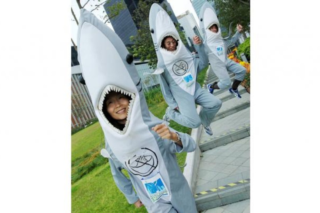 From left, runners Janet Ng, Kenneth Chan and Anthony Leung King-yan in their outfits for the race on February 24. Photo: Nora Tam