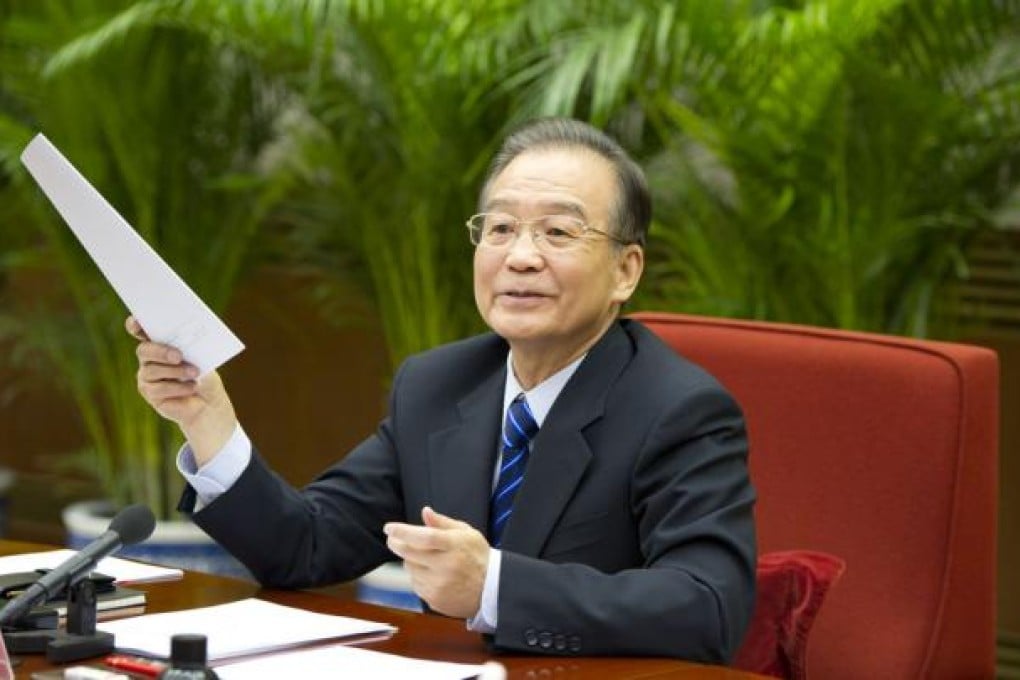 Outgoing Premier Wen Jiabao addressed Beijing's air pollution problem only in passing when soliciting views on his last government work report. Photo: Xinhua