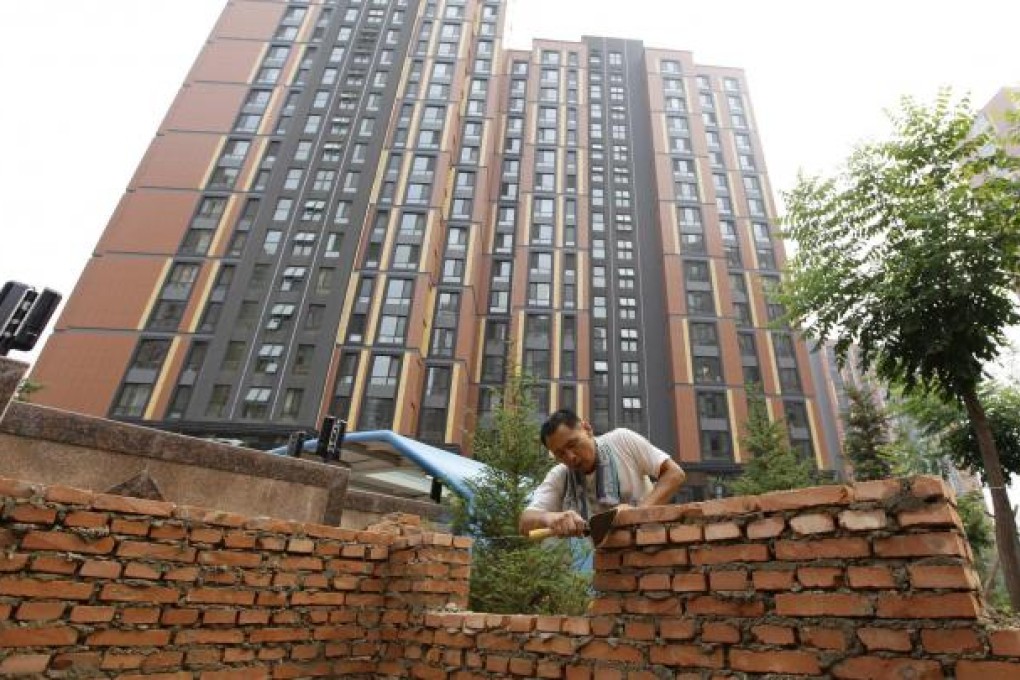 China must roll out new measures to combat speculative housing demand as risks of a home price rebound rise. Photo: Reuters