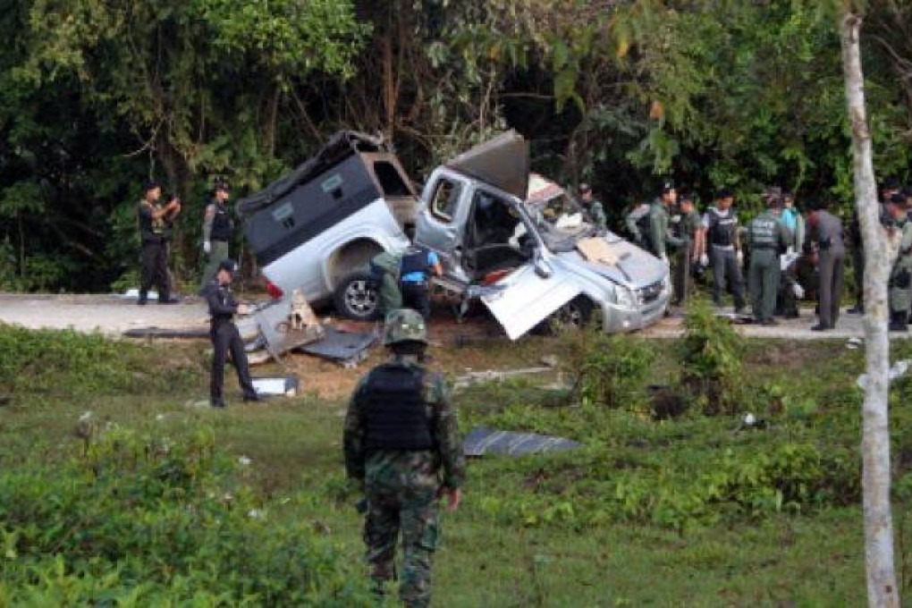 A recent roadside bomb attack by separatist militants in southern Thailand. In the latest violence in the region, militants have shot dead four fruit traders. Photo: AFP