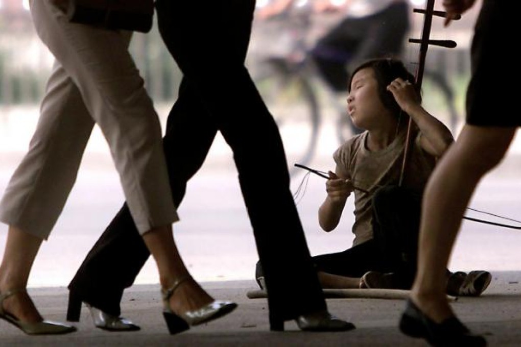 The central government has issued guidelines on the long-awaited income distribution reform in a bid to narrow the gap between the rich and the poor. Photo: AFP