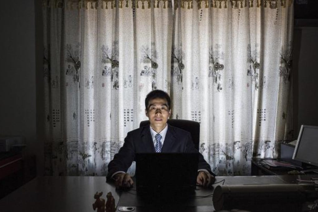 Zhu Ruifeng, a citizen journalist known for recently exposing sex scandals and corruptions. Photo: NYT
