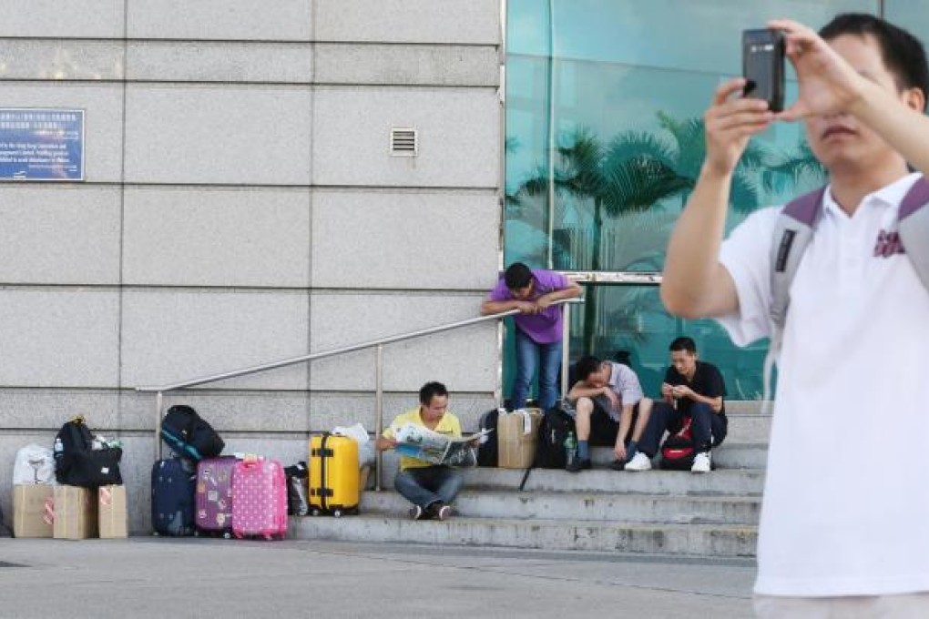 With prices on many products cheaper in Hong Kong, many people living in Guangdong find the cost and effort of getting to the city is well worth it. They save hundreds of yuan on every trip. Photo: Felix Wong