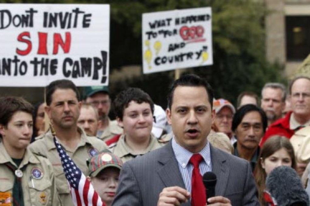 Jonathan Saenz, President of Texas Values, speaks at the Boy Scouts of America headquarters in Irving on Wednesday. The scouts on Wednesday delayed  a vote on whether to end a ban on gays. Photo: Reuters