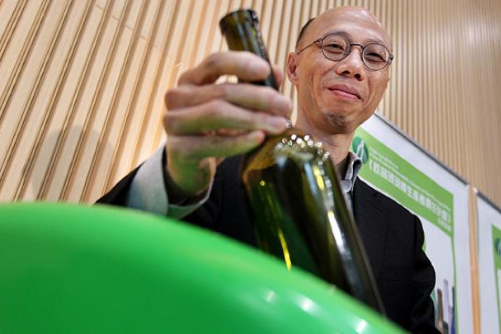 Secretary for the Environment, Wong Kam-sing meets the media on the government propose a levy on glass bottles as part of a recycling scheme. Photo: Sam Tsang