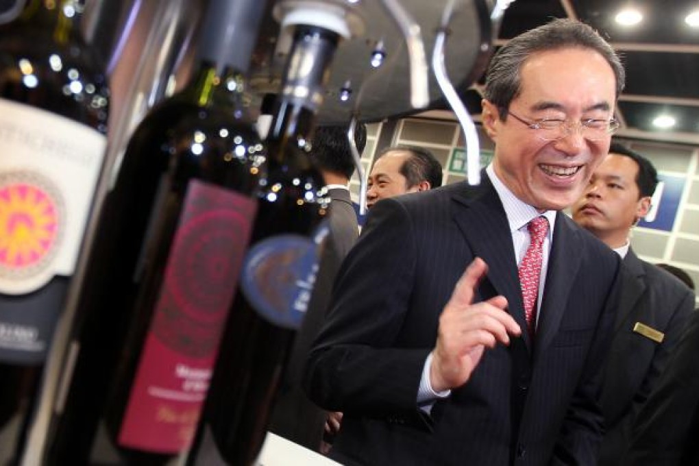 Then Chief Secretary Henry Tang officiates at the opening of a trade show in Hong Kong in May, 2011. Photo: SCMP