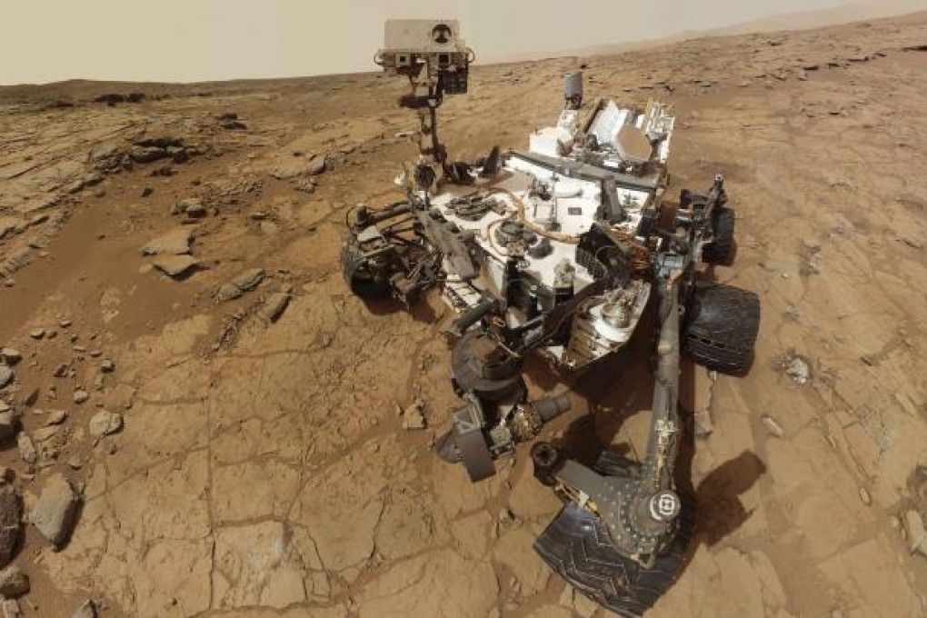 A self-portrait of Nasa's Mars rover Curiosity positioned on a patch of flat outcrop billed "John Klein". Photo: Reuters/Nasa