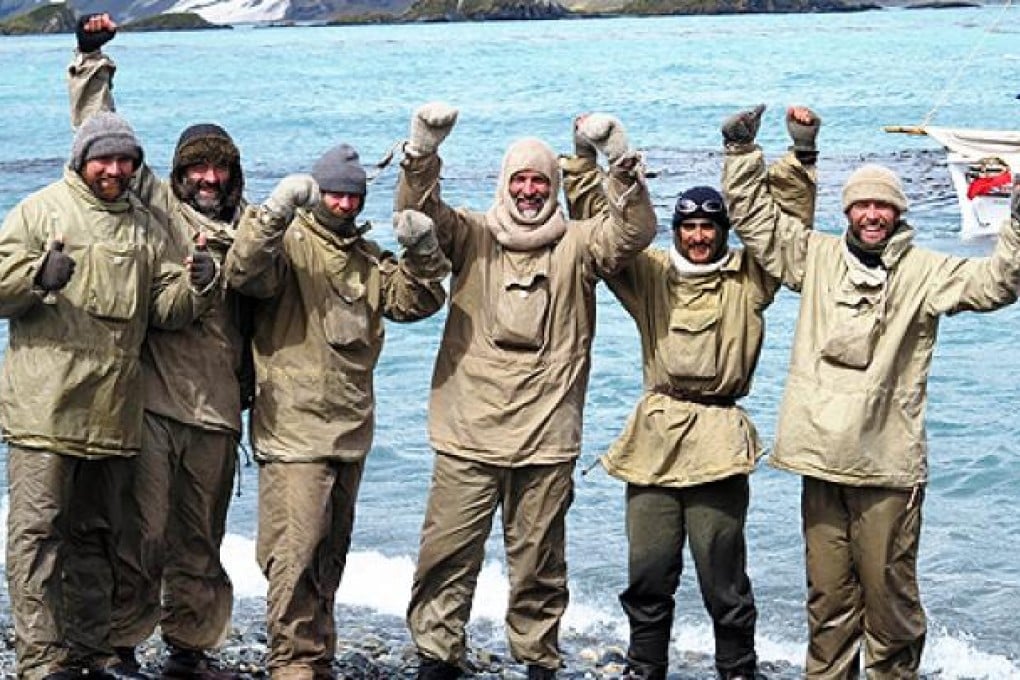 The Alexandra Shackleton team onshore at South Georgia cheering their successful completion of leg one of their historic re-enactment. Photo: AFP