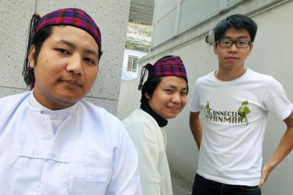 Htoi Awng (left) and Mung Don with volunteer Edward Tsoi Mang-hin.