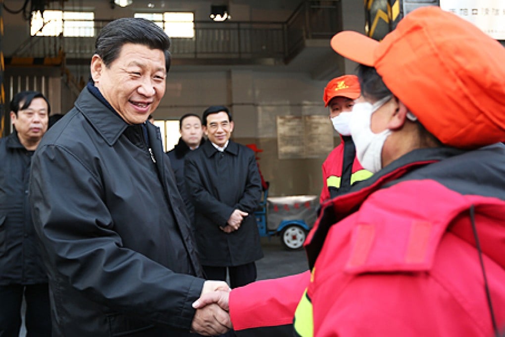 Chinese leader Xi Jinping meets with sanitation workers in Beijing on Friday. Photo: Xinhua