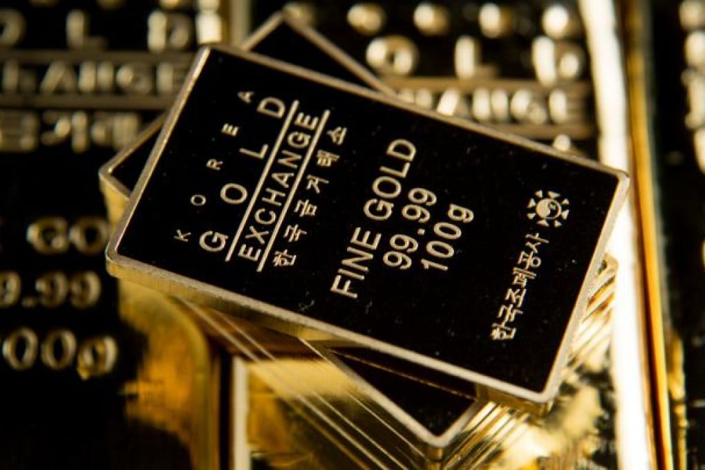 According to fung shui master Wong Man-chiu, gold will have an upward trend and people will buy the precious metal as a safe haven. Photo: Bloomberg