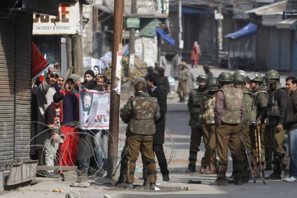 Three people have so far died in clashes that erupted in Kashmir after parliament attack convict Muhammad Afzal Guru was executed in New Delhi. Photo: EPA