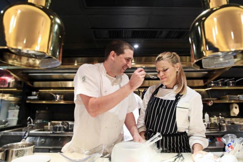 Serge Theriault (left) met girlfriend Andrea Ford working in a restaurant, and now the two of them cook together on Valentine's Day. Photo: Jonathan Wong