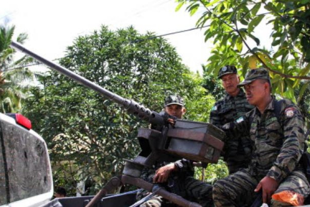 Members of Moro Islamic Liberation Front (MILF) at a compound near the MILF headquarters in Camp Darapanan in Maguindanao province, south of Manila. Photo: EPA