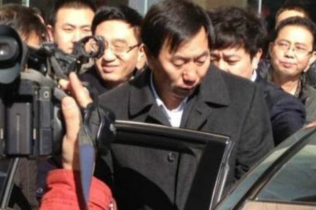 Datong's outgoing mayor Geng Yanbo (centre). Photo: China News Agency