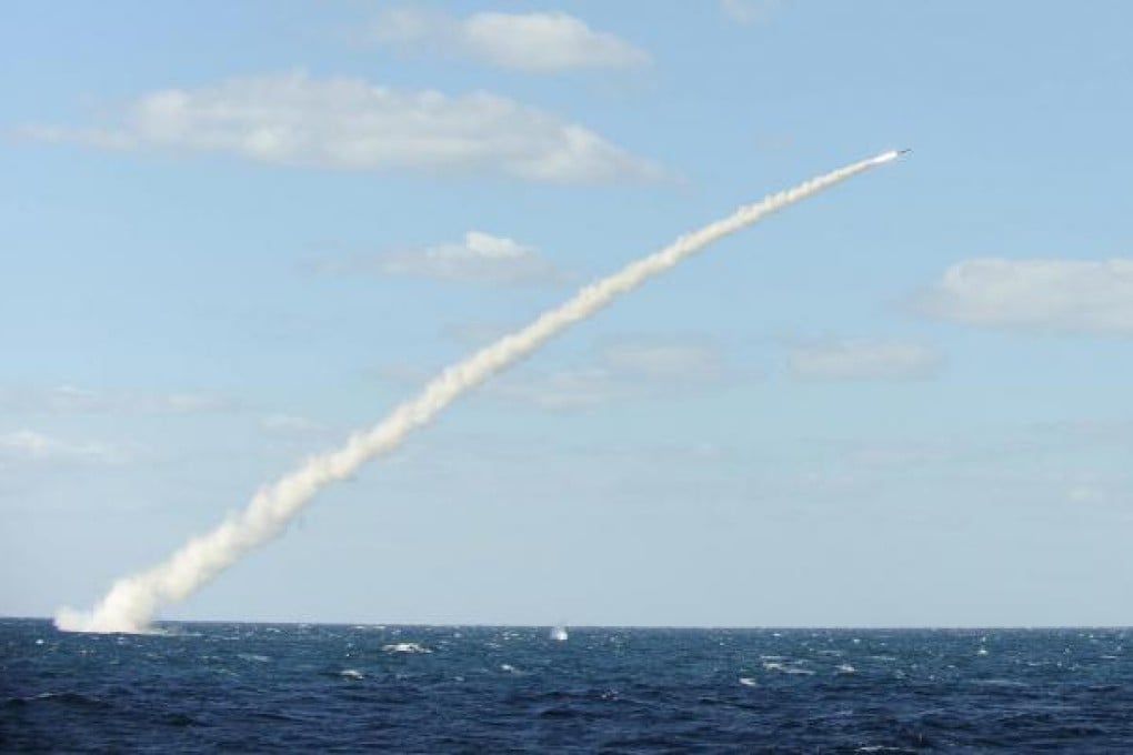 A South Korean photo shows the launch of a missile at sea. The South's military has been on heightened alert since Pyongyang threatened to carry out its nuclear test. Photo: AFP