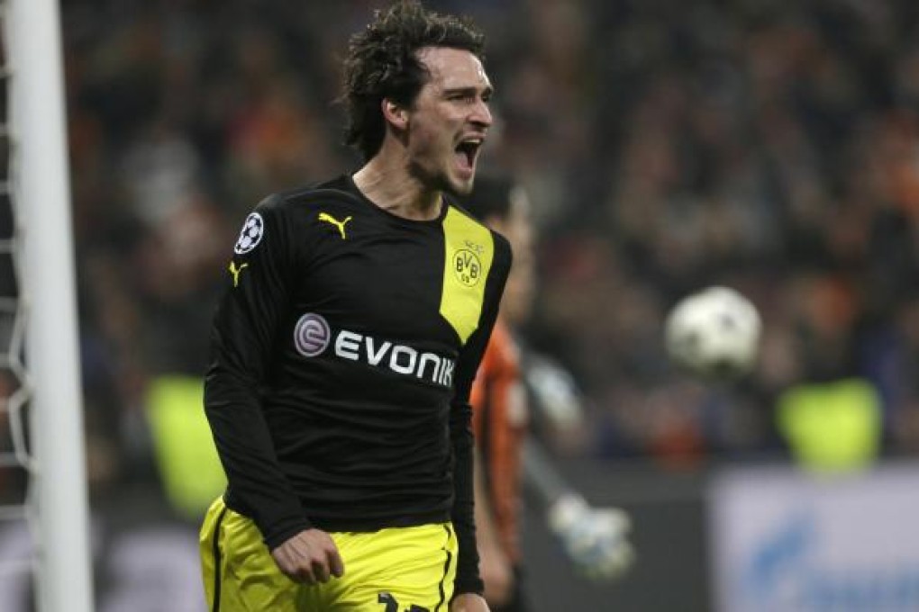 Mats Hummels after scoring against Shakhtar. Photo: AP