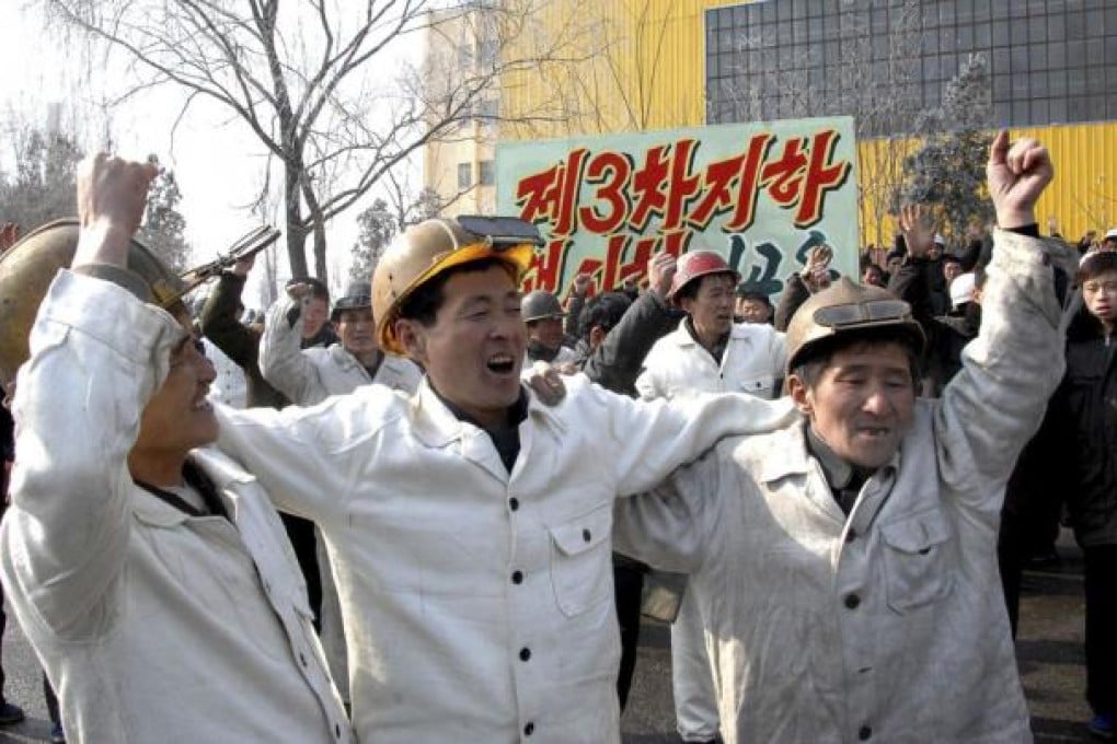 North Korean workers celebrate North Korea's nuclear test. Photo: Reuters
