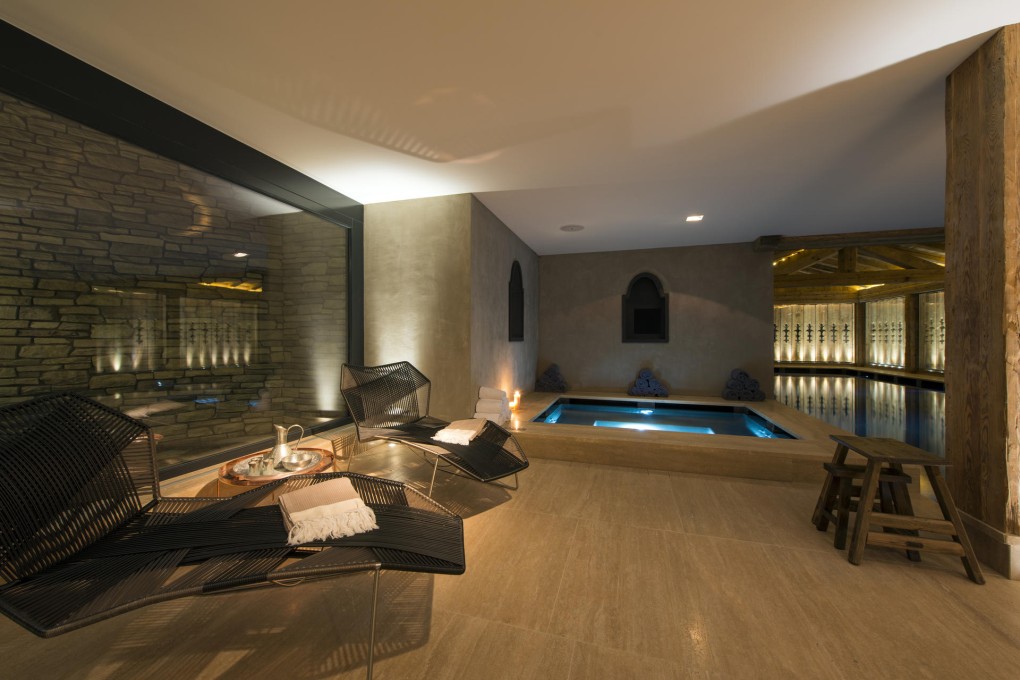 The spa at the Cordee des Alpes (above); rooms and suites feature open fireplaces and balconies (below).Photos: Yves Garneau