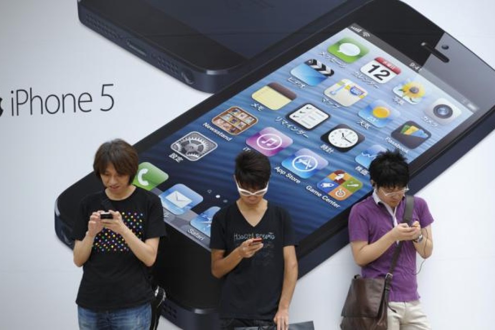 Growing numbers of people are apparently addicted to electronic gadgets providing continuous, always-on media and communications. Photo: Bloomberg