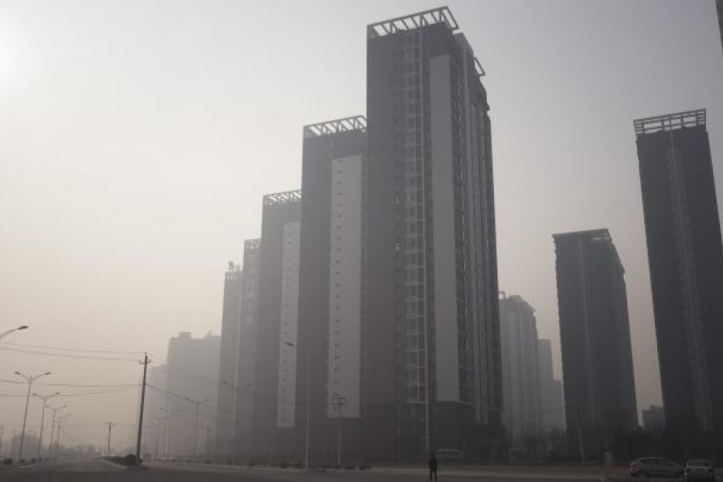 New high rises under construction in the Wangjing district of Beijing. New stability and waning uncertainties have been steadily boosting transaction volumes in China's real estate market. Photo: EPA