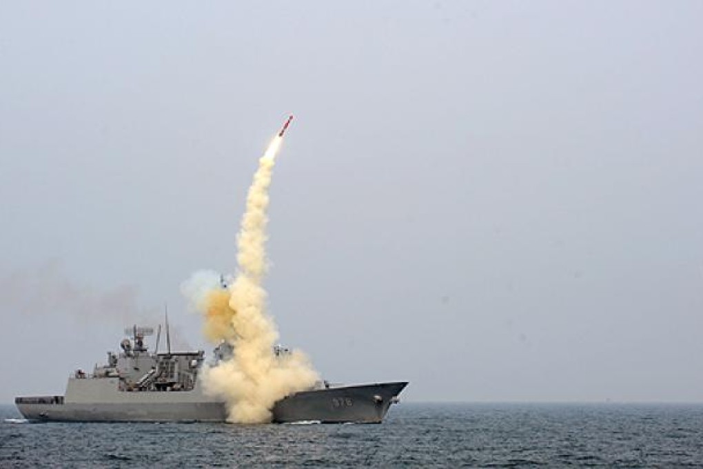 South Korea test-launches a new cruise missile from a warship. Photo: AFP